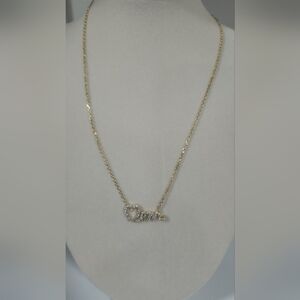 Kate Spade Gold Necklace with Silver Love Pendant